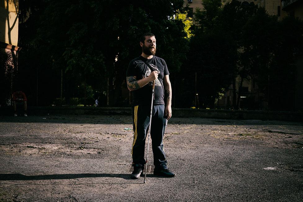 A man stands in the street