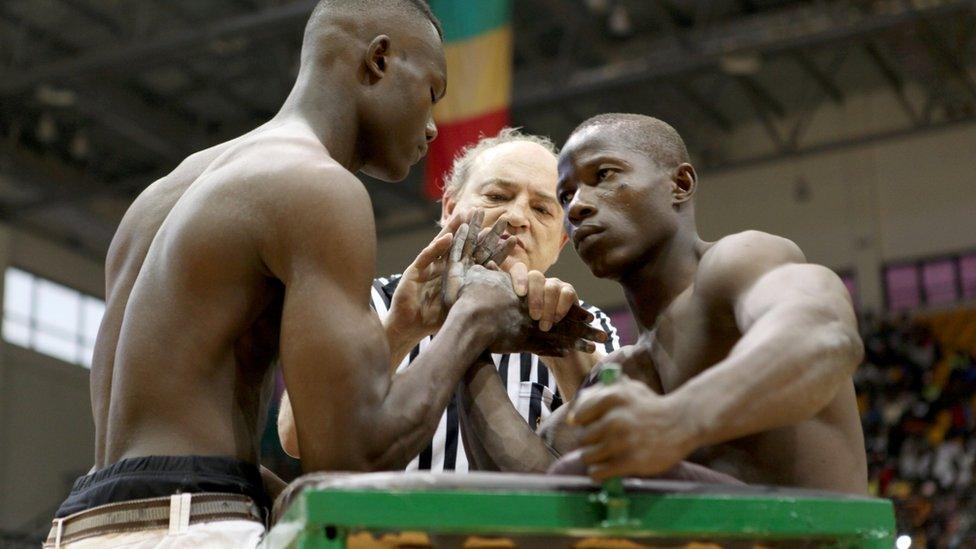 Arm wrestlers compete at the International Arm Wrestling Championship in Bamako, Mali - Sunday 29 May 2016