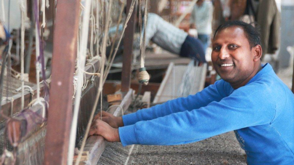 Weaver at a loom