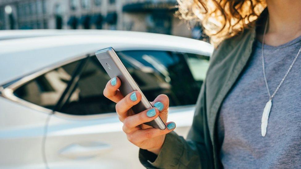 Woman looking at mobile phone