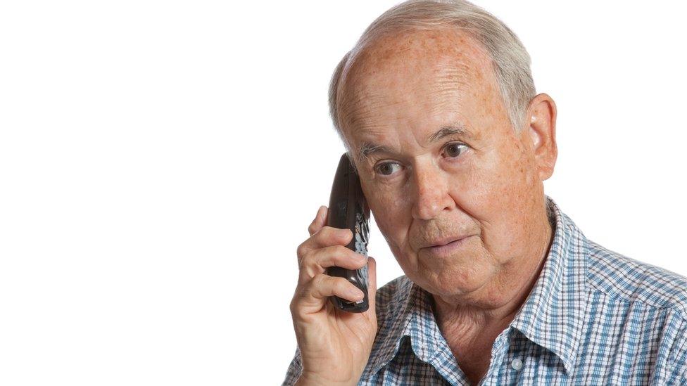 older man on phone