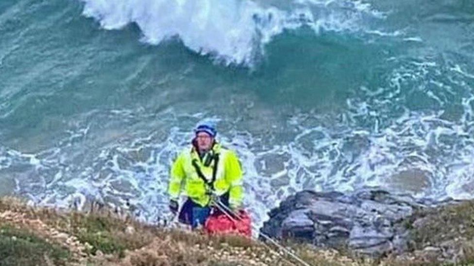 Cliff technician on cliff face