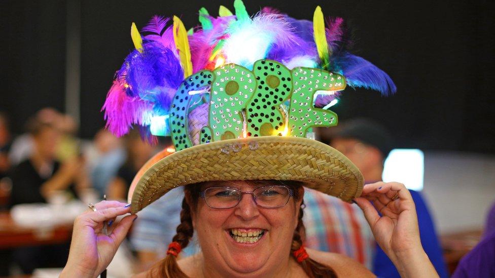 Visitors during the traditional hat day during the CAMRA Great British Beer Festival at Olympia in London.