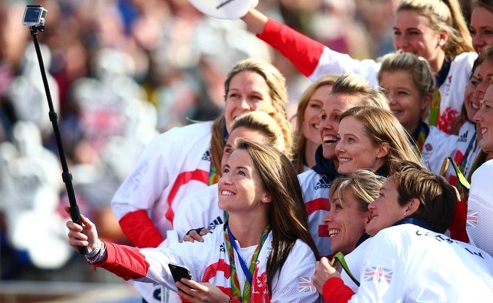 Womens hockey player, Maddie Hinch takes a group selfie