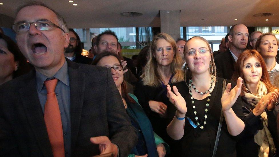 Supporters of Cologne mayoral candidate Henriette Reker react after early results. 18 October 2015