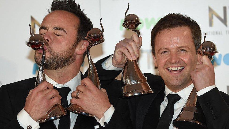 Ant and Dec holding trophies