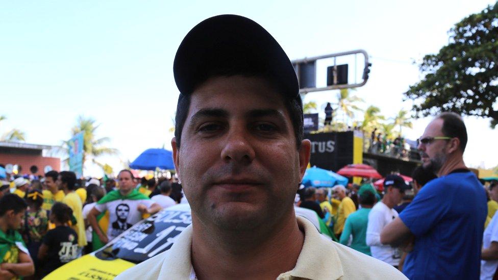 Kleber Freire poses for a picture at a Bolsonaro rally