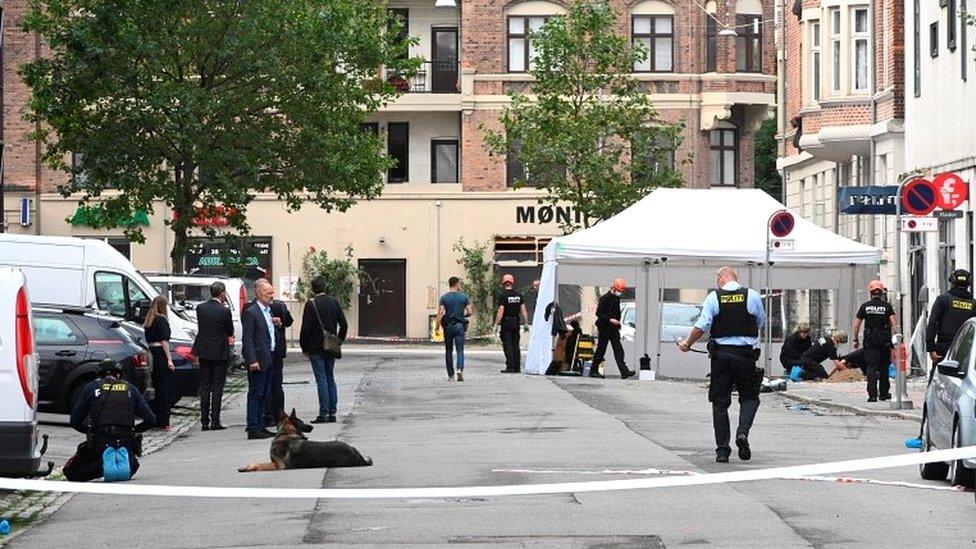 Danish police technicians inspect the scene outside a local police station, following an explosion in Copenhagen, Denmark August 10, 2019