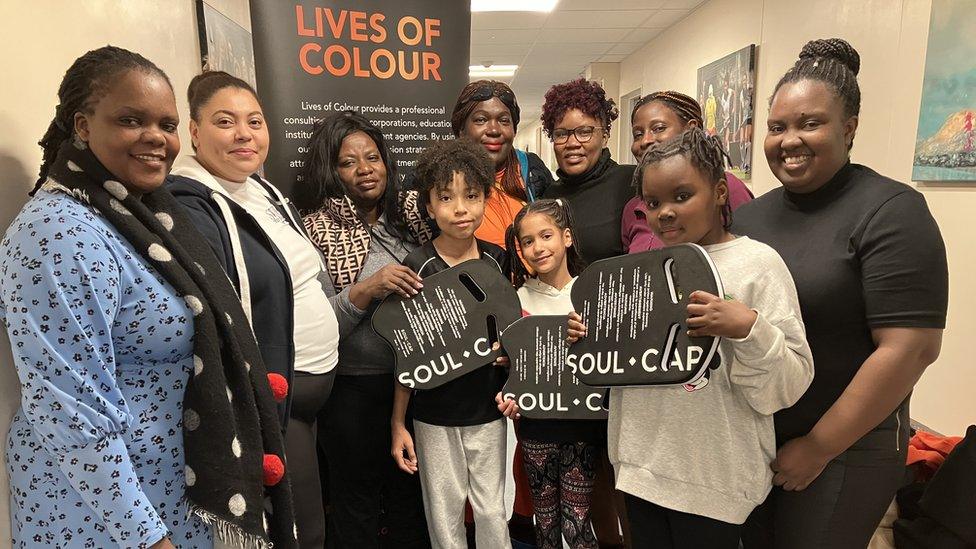 Photo of Swimmers of Colour group standing together