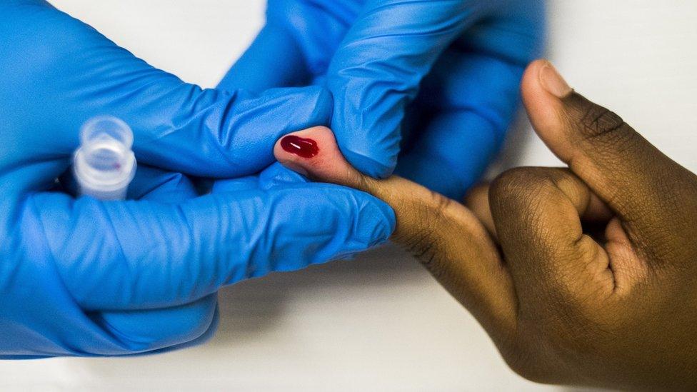 A child receiving a blood test