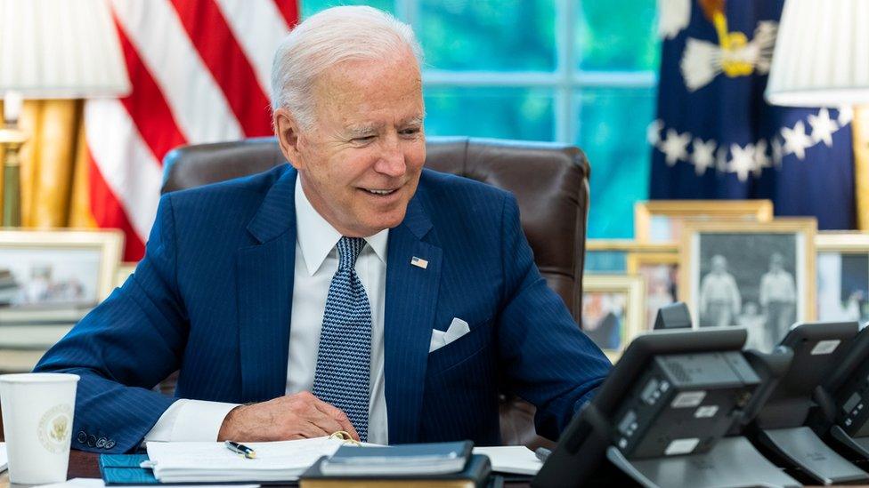 Joe Biden on the phone to Emmanuel Macron