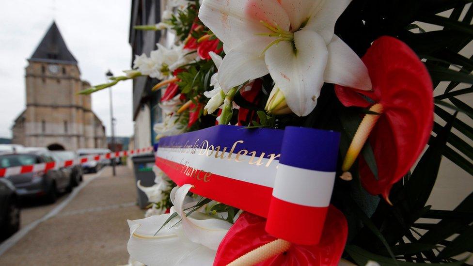 memorial stands near the Saint Etienne church