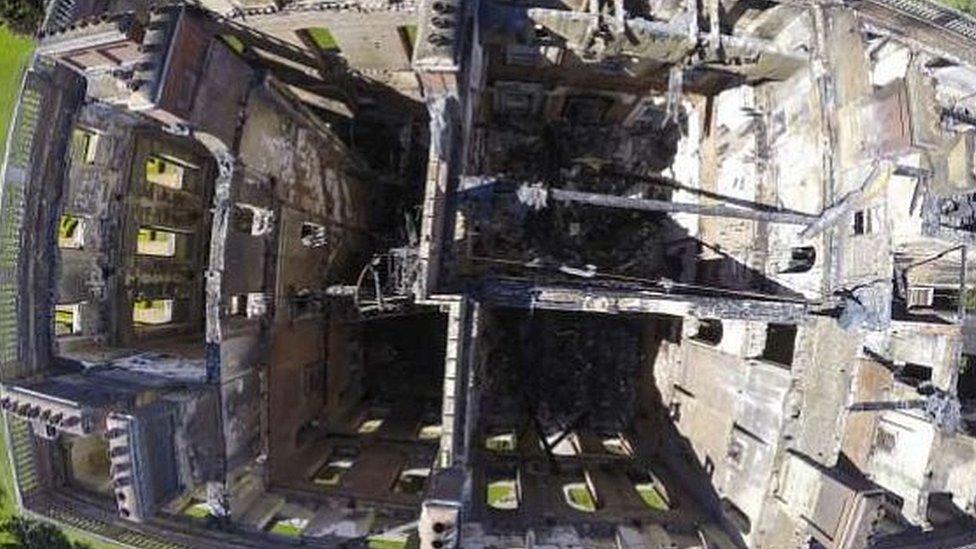 Aerial view of burnt-out mansion