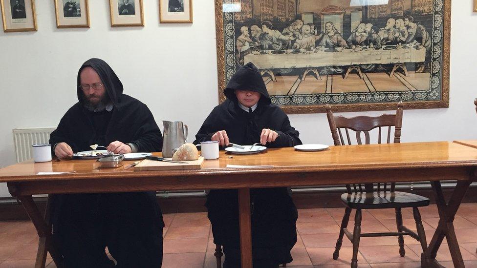 Monks eating lunch