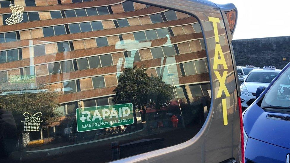 Taxi window with Rapaid sticker