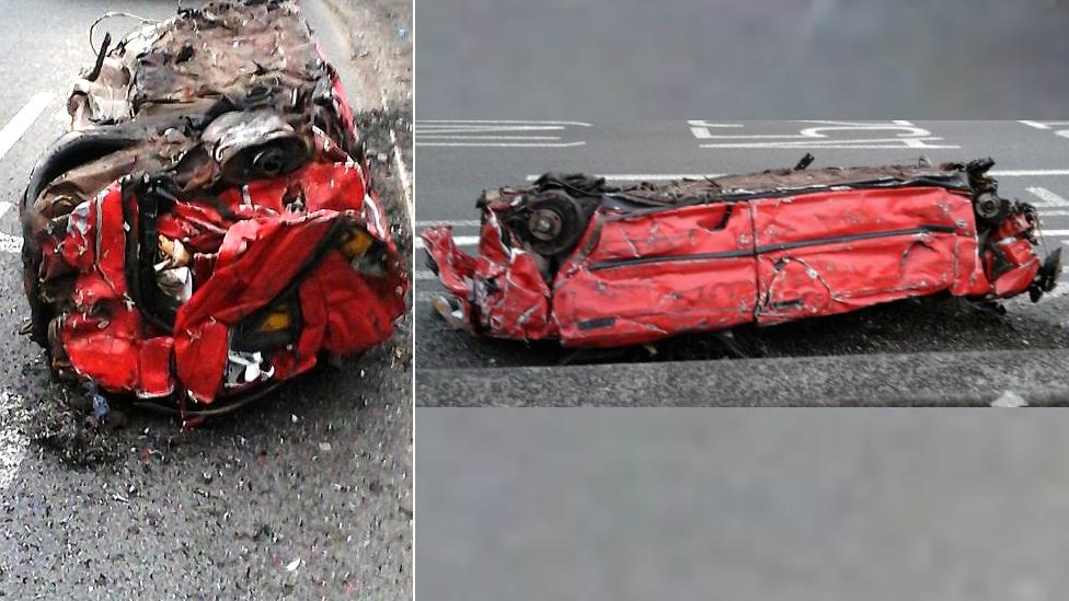 Crushed car on M1