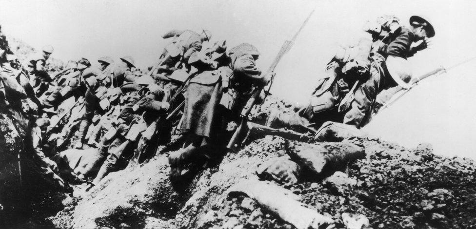 British troops climbing from their trench on the first day of 'The Big Push' on the Somme during World War I