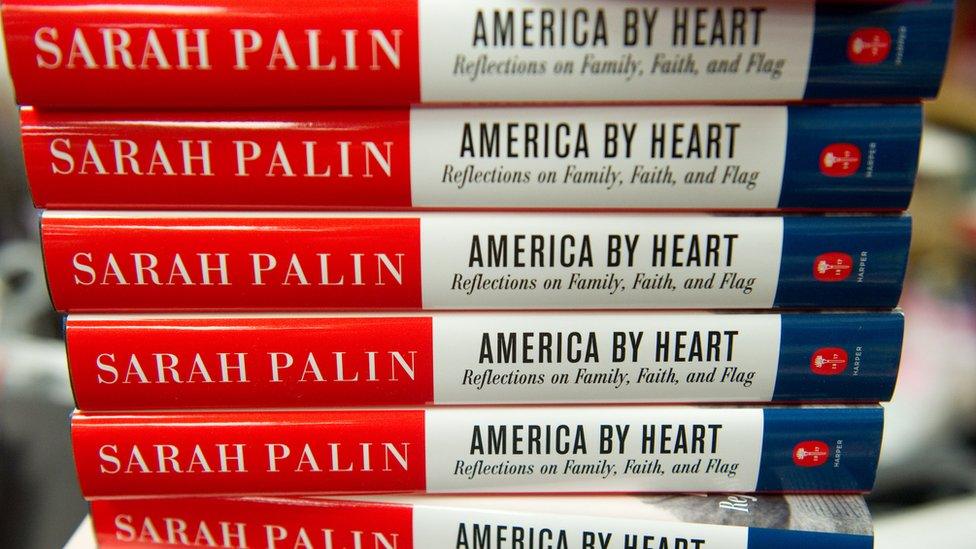 Former Alaska Governor and Republican Vice Presidential candidate Sarah Palin's new book, 'America by Heart: Reflections on Family, Faith and Flag,' sits on a counter in the Politics and Prose Bookstore in Washington, DC, November 23, 2010