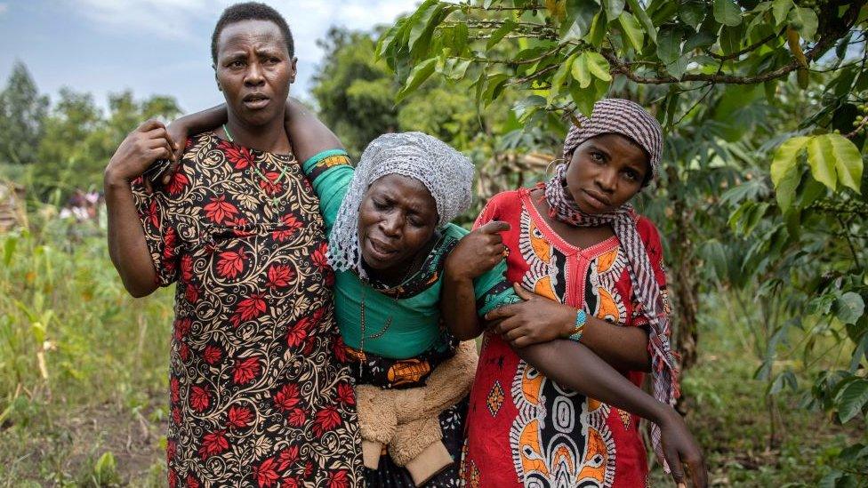 Mourner at a funeral in Mpondwe, Uganda - 18 June 2023