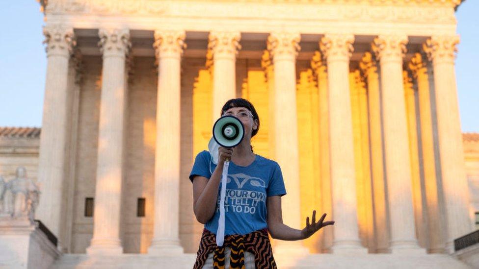 An activist outside the Supreme Court protests against the new Texas abortion law that prohibits the procedure around six weeks into a pregnancy on September 2, 2021 in Washington, DC