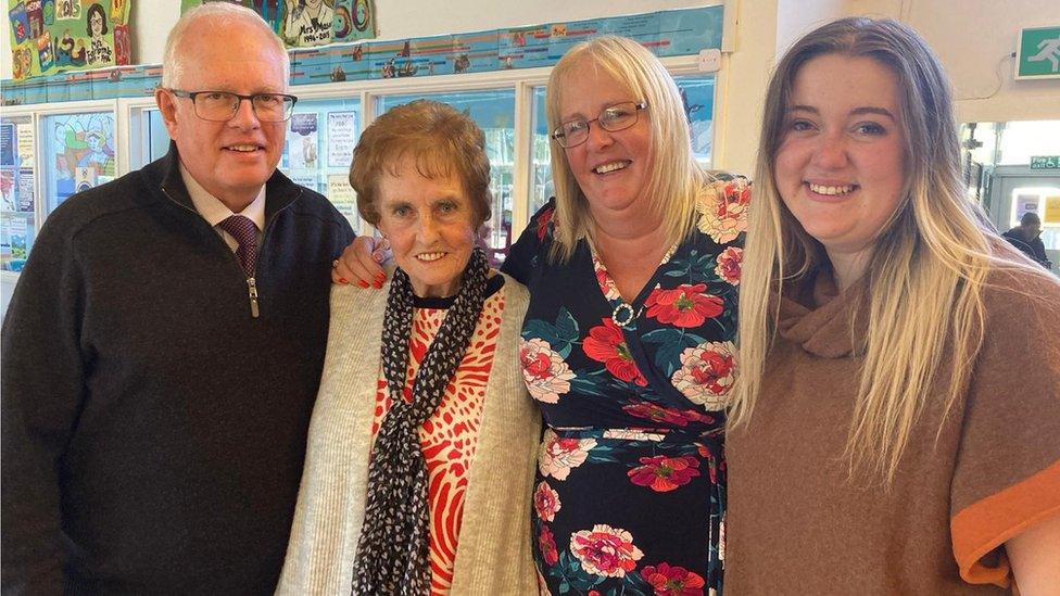 Theresa with her children and granddaughter