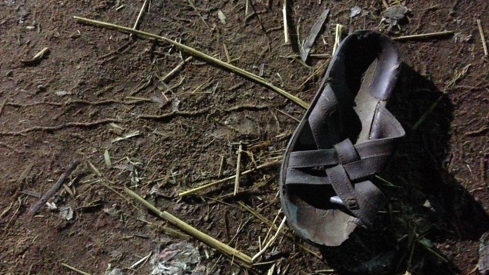 Discarded sandal outside the Puttingal temple, 10 April 2016