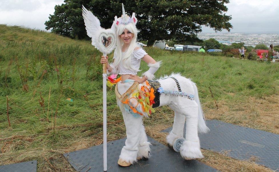 Ella Hill, dressed as a unicorn with wand