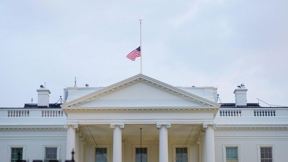 US flag flies at half-mast above the White House after the death of Senator John McCain