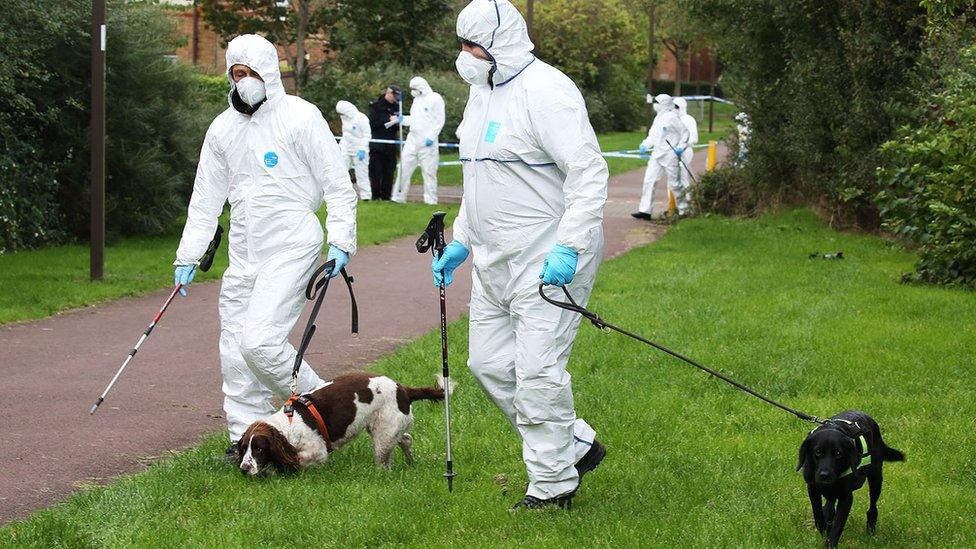 Forensic officers at the scene of the Milton Keynes stabbings