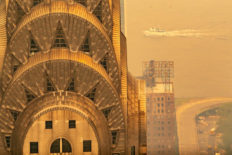 The Chrysler Building is covered in a smoky haze from wildfires in Canada as it blankets Manhattan on 7 June 2023 in New York City, US