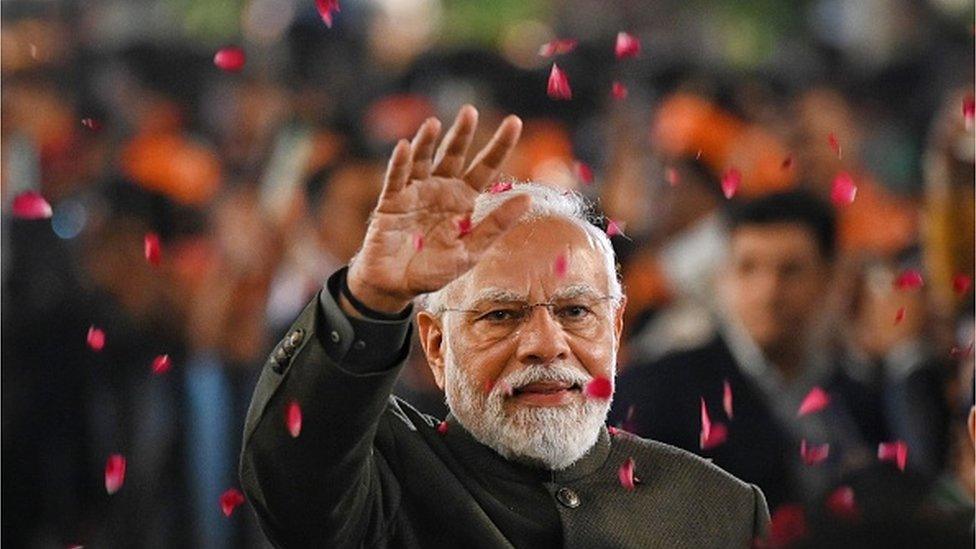 Prime Minister Narendra Modi greets the supporters during celebrations after party's victory in elections to the Legislative Assemblies of Madhya Pradesh, Rajasthan and Chhattisgarh, at BJP headquarters,at BJP Headquarters on December 3, 2023 in New Delhi, India.