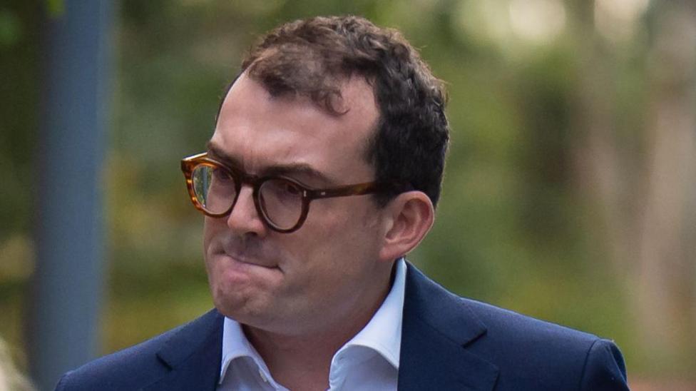 MP arrives at court for sexual assault trial