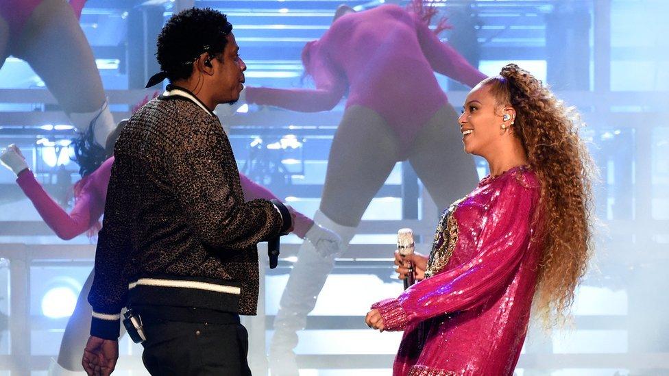 Beyonce and Jay-Z performing on stage