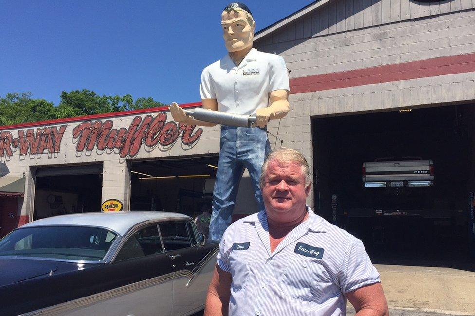 Shawn Fennel with his Muffler Man