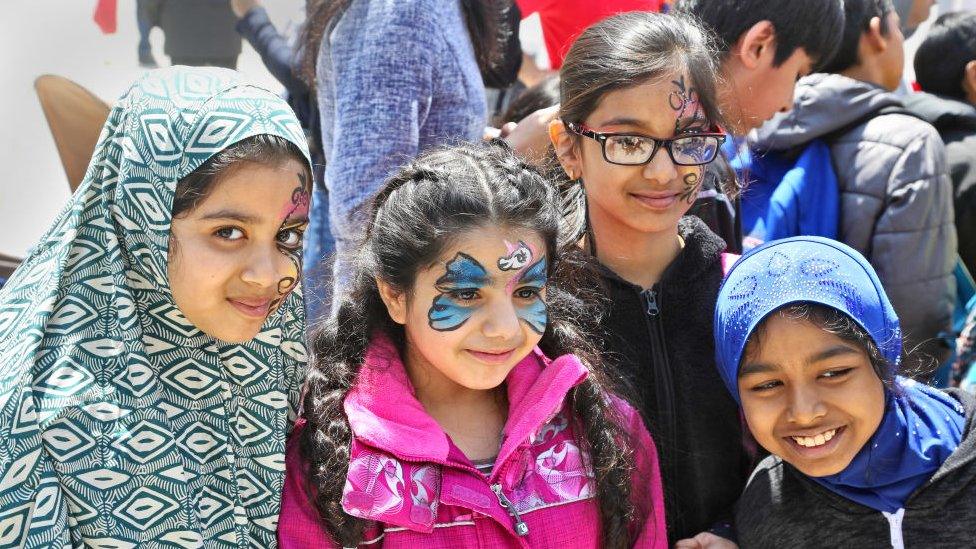 Children at an event celebrating immigration to Canada