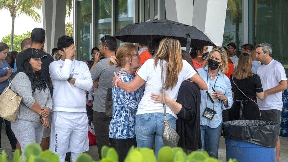 Families and friends of people that could have been at the partial collapse of the building in Surfside are waiting for information at the Surfside Community Center in Surfside, Florida, on 24 June 2021