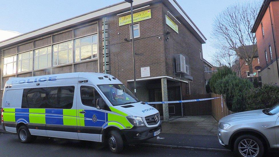 Police vehicle outside Fatima community centre