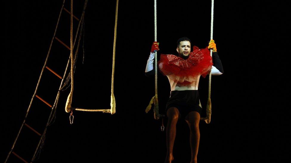 A Tunisian actor performs during the Multidisciplinary show, 'Black & White Circus', a production by Nawel Skandrani in Tunis, Tunisia, 17 May 2024.