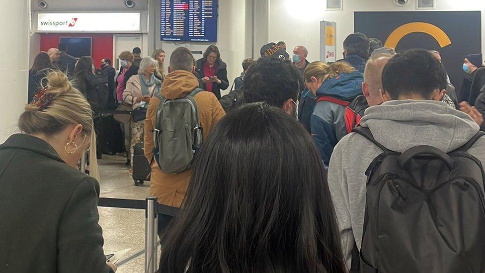 Handout photo of the security queue at Birmingham airport.