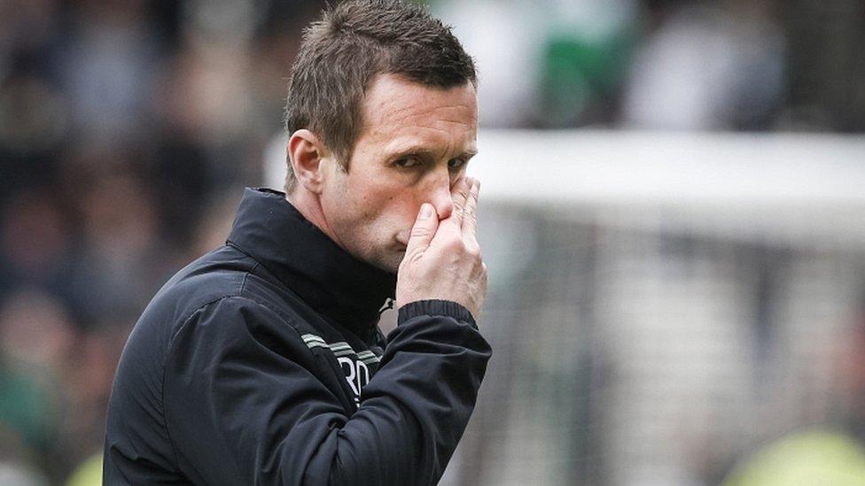 Celtic manager Ronny Deila looks dejected after defeat by Rangers