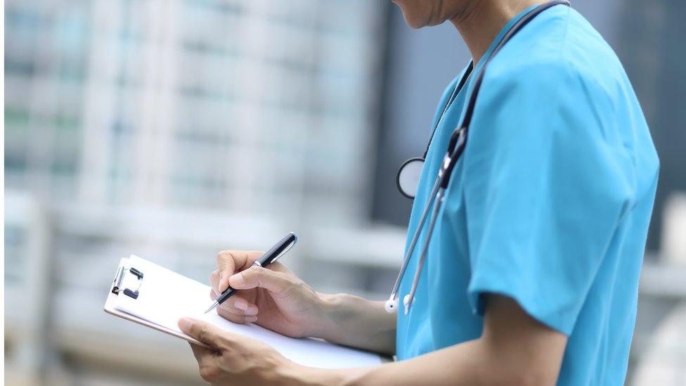 Nurse with clipboard