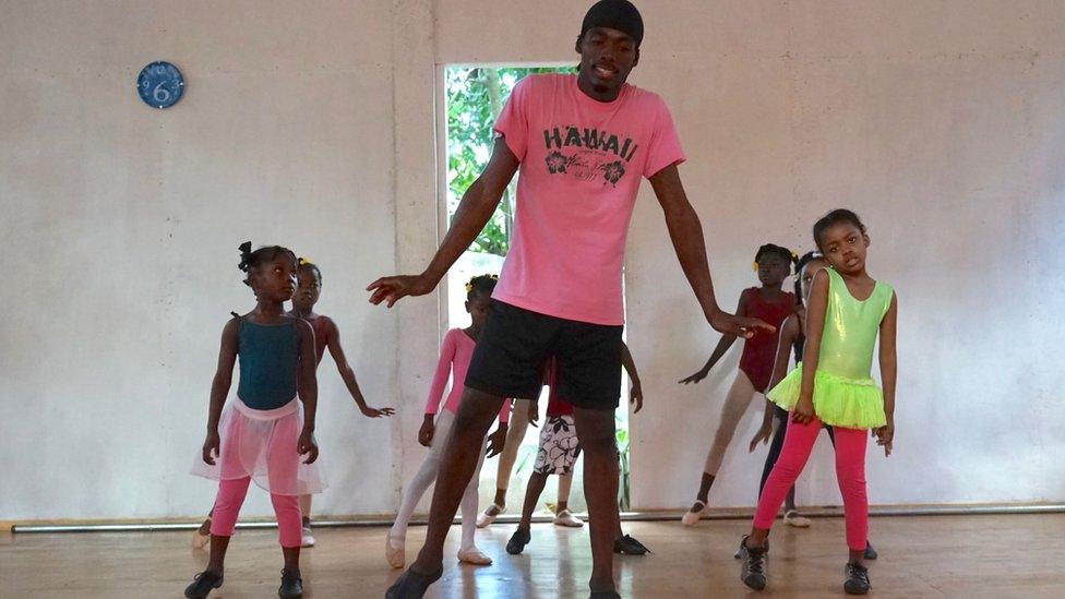 Kids dancing with teacher in front