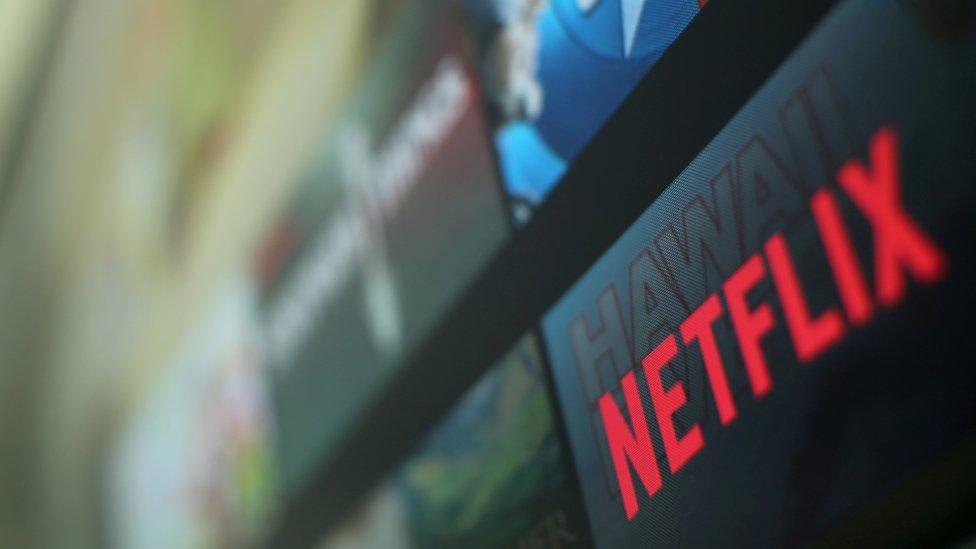 he Netflix logo is pictured on a television in this illustration photograph taken in Encinitas, California, U.S., January 18, 2017