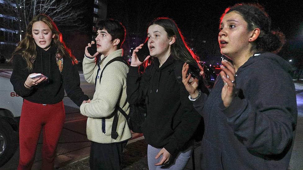 Michigan State University students react during an active shooter situation on campus on February 13, 2023 in Lansing, Michigan