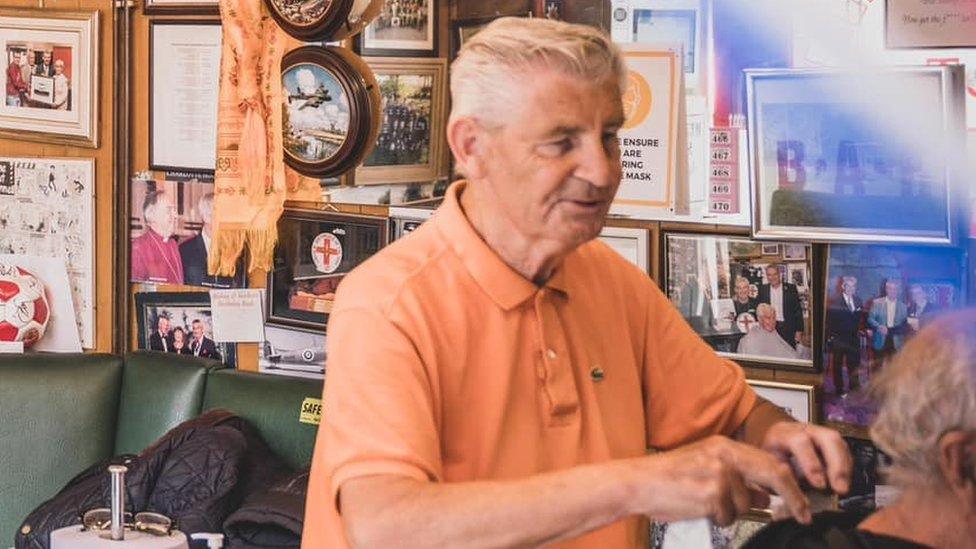 Frank Connell cutting hair