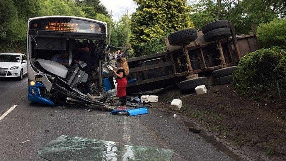 bus and tractor collision aftermath