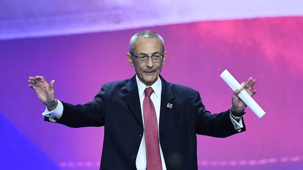 Democratic presidential nominee Hillary Clinton's campaign manger John Podesta gestures before speaking during election night at the Jacob K. Javits Convention Center in New York on November 9, 2016