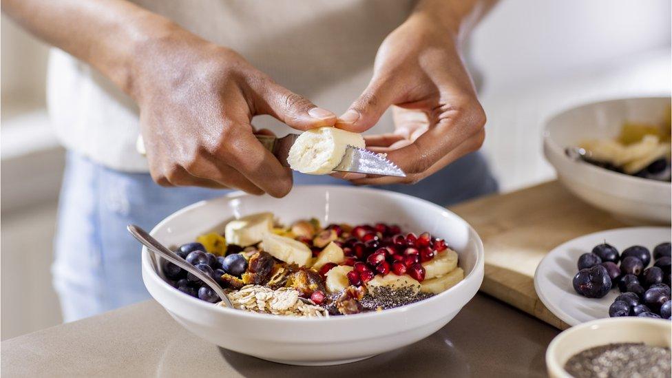 Someone preparing a healthy meal