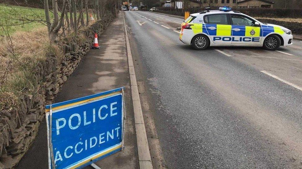 Police car on the A629 Penistone Road following an accident in 2021