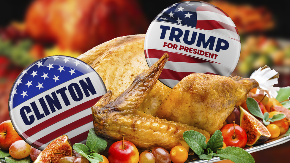 A Clinton badge and a Trump badge tucked into a turkey